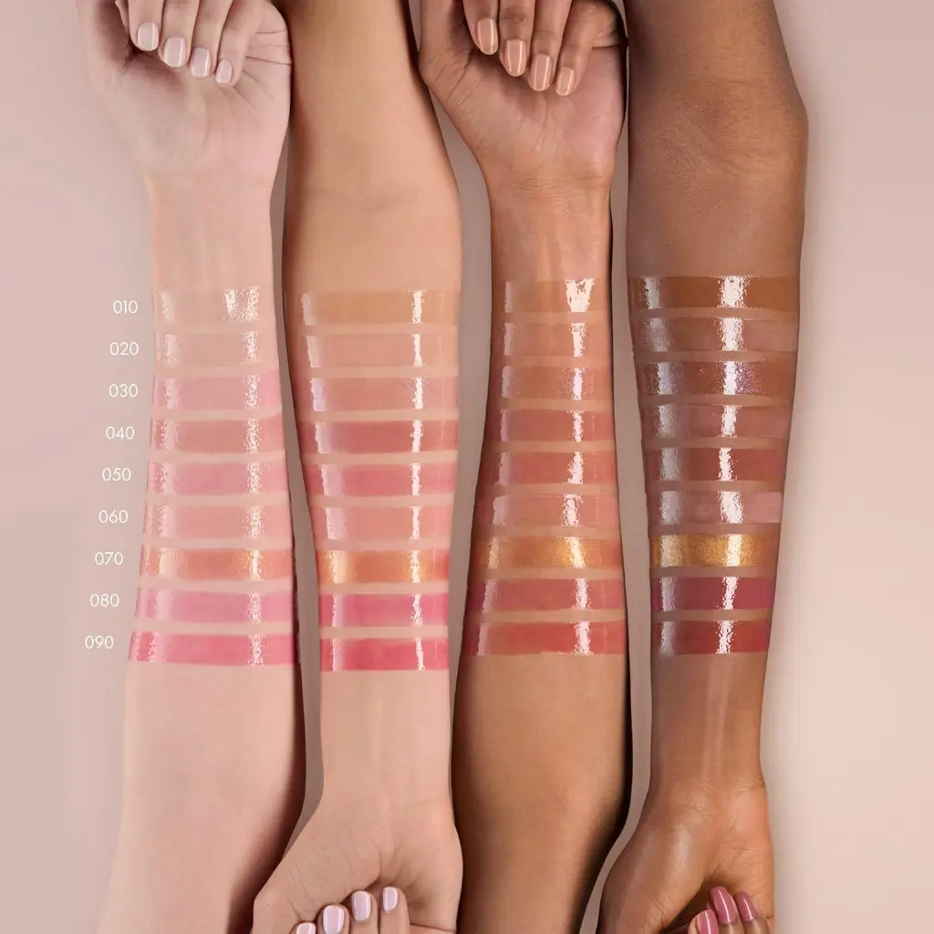 Catrice Glossin' Glow Tinted Lip Oil HAND.webp